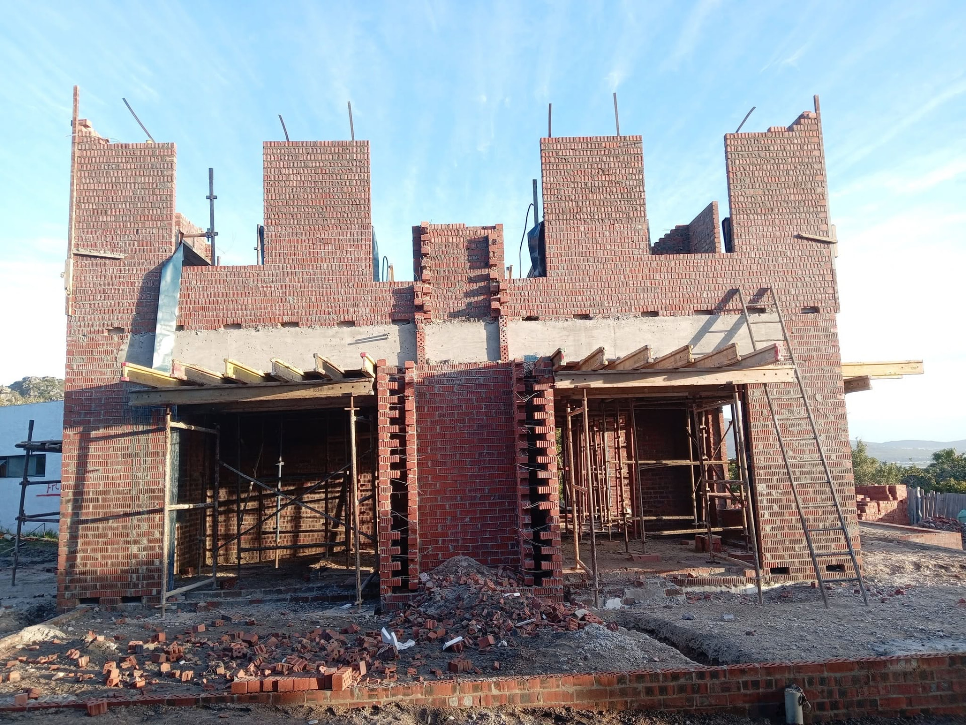 Brick house and timber formwork — Majors Builders