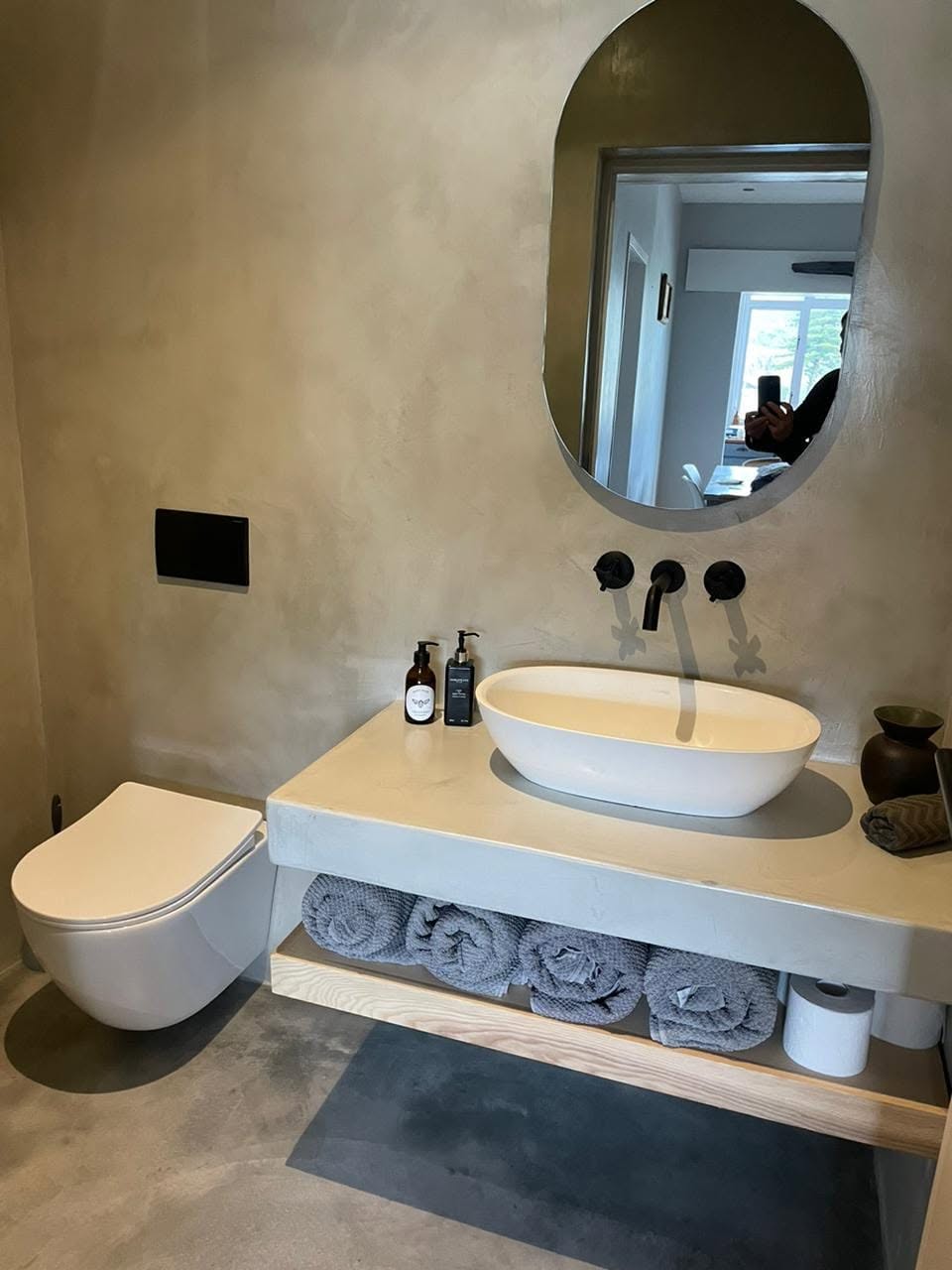 Bathroom vanity and tiled wall — Majors Builders